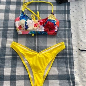 Brand new yellow colored bikini , high leg
